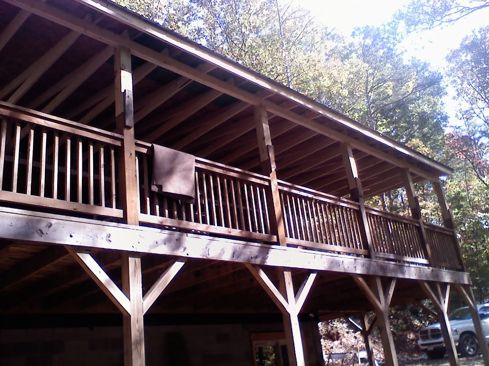 Timber framing under a new elevated porch and deck — Roof Leak Repair in La Crescenta by Roofing Brothers